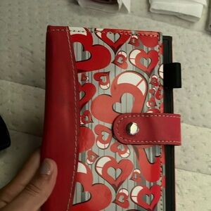 I am selling a wallet with a little penholder